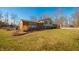 Well-maintained lawn with a brick home and manicured landscaping at 6602 S 400 W, Columbus, IN 47201