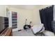 Bedroom featuring an exercise bike and closet storage space at 715 S Ribble Ave, Muncie, IN 47302