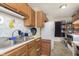 Functional kitchen featuring ample cabinetry and essential appliances at 715 S Ribble Ave, Muncie, IN 47302