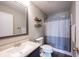 Bathroom with vanity, mirror, shelving and shower/tub combo at 7576 Hollow Reed Ct, Noblesville, IN 46062