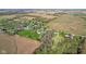 An aerial perspective showcasing a rural landscape with homes, farmland, and lush greenery at 800 N 400 W, Bargersville, IN 46106