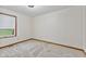 Carpeted bedroom with a window for natural light at 800 N 400 W, Bargersville, IN 46106