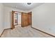 Bedroom with carpet, built-in closet, and wood trim at 800 N 400 W, Bargersville, IN 46106