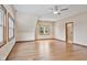 Bright bedroom with hardwood floors, ceiling fan, and multiple windows at 800 N 400 W, Bargersville, IN 46106