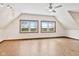 Spacious bedroom with two windows, hardwood floors, and ceiling fan at 800 N 400 W, Bargersville, IN 46106