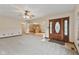 Inviting foyer with an ornate front door, tile flooring, and views into the dining area at 800 N 400 W, Bargersville, IN 46106