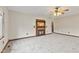 Cozy living room with plush carpet, fireplace, and a ceiling fan at 800 N 400 W, Bargersville, IN 46106