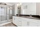 Bathroom featuring a glass door shower and a double vanity at 848 Kinzer Ave, Carmel, IN 46032