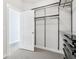 Open door to the closet and metal shelves at 848 Kinzer Ave, Carmel, IN 46032