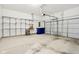 Two-car garage with shelving and storage at 848 Kinzer Ave, Carmel, IN 46032
