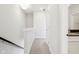 Upstairs hallway leading to a bathroom at 848 Kinzer Ave, Carmel, IN 46032