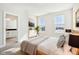 Main bedroom features large windows, natural light, and an ensuite bathroom at 848 Kinzer Ave, Carmel, IN 46032