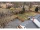 Aerial view showing house with large backyard and basketball court at 8825 Dunsmuir Dr, Indianapolis, IN 46260