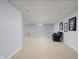 Spacious carpeted basement with neutral walls, carpeted floors, and sports memorabilia at 8825 Dunsmuir Dr, Indianapolis, IN 46260