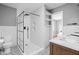 Walk in shower with white subway tile, geometric tile floors, and sleek fixtures at 8825 Dunsmuir Dr, Indianapolis, IN 46260