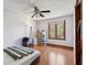 Spacious bedroom with hardwood floors and natural light from a large window at 901 Detroit St, Beech Grove, IN 46107