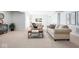Finished basement featuring neutral walls, beige carpeting, and comfortable furniture for a welcoming space at 9658 Farragut, Indianapolis, IN 46256