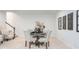 Cozy dining area with seating for four, perfect for intimate meals and gatherings at 9658 Farragut, Indianapolis, IN 46256