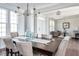 Spacious dining room with chandelier and open view to the living room at 9658 Farragut, Indianapolis, IN 46256