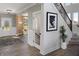 Stylish entryway with staircase, modern accents, and natural light at 9658 Farragut, Indianapolis, IN 46256