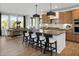 Beautiful kitchen with an island, stainless steel appliances, and easy access to dining area at 9658 Farragut, Indianapolis, IN 46256