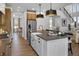 Spacious kitchen with a large island, stainless steel appliances, and pendant lighting at 9658 Farragut, Indianapolis, IN 46256