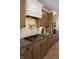 Elegant kitchen boasts a gas range, pot filler faucet, and stylish backsplash at 9658 Farragut, Indianapolis, IN 46256