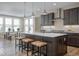 Spacious eat-in kitchen with island, pendant lighting, and stainless steel appliances at 9658 Farragut, Indianapolis, IN 46256
