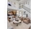 Open-concept living room with seamless flow to the kitchen and staircase at 9658 Farragut, Indianapolis, IN 46256