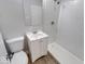 Clean bathroom featuring a vanity with sink, and tiled shower at 1002 Payton Ave, Indianapolis, IN 46219