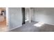 Bright bedroom with mirrored closet doors and neutral carpet at 1002 Payton Ave, Indianapolis, IN 46219