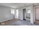 Spacious bedroom with large windows and plush carpeting at 1002 Payton Ave, Indianapolis, IN 46219