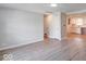 Inviting living area with adjacent kitchen view, featuring modern flooring, and a welcoming atmosphere at 1002 Payton Ave, Indianapolis, IN 46219