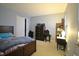 Bedroom featuring a wood bed frame and furnishings, neutral carpet, and closet at 1169 Richmond Ln, Greenwood, IN 46143