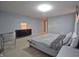 Modern bedroom with a grey color scheme, stylish furniture, and lots of space at 1169 Richmond Ln, Greenwood, IN 46143
