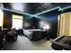 Unique bedroom with dark walls, LED lighting, and musical instruments at 1169 Richmond Ln, Greenwood, IN 46143