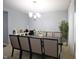 Elegant dining room featuring a large table with seating for ten, perfect for hosting gatherings at 1169 Richmond Ln, Greenwood, IN 46143