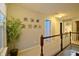 Bright hallway with decorative art and trim, leading to other rooms within the home at 1169 Richmond Ln, Greenwood, IN 46143