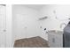 Laundry room with vinyl flooring, utility sink, washer and dryer hookups at 1438 Willow Tree Ln, Sheridan, IN 46069