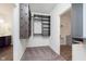Walk-in closet with custom shelving and storage solutions and access to the laundry room at 1438 Willow Tree Ln, Sheridan, IN 46069