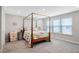 Bright bedroom featuring a four poster bed, carpeted floor and natural light at 17330 Graley Pl, Westfield, IN 46074