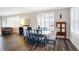 Dining area filled with natural light featuring wooden floors and cozy furnishings at 17330 Graley Pl, Westfield, IN 46074