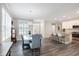 This dining room features beautiful wood floors, lots of light, and an open floor plan at 17330 Graley Pl, Westfield, IN 46074