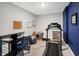 Finished basement converted into an exercise room with a treadmill and desk at 17330 Graley Pl, Westfield, IN 46074