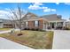 Well maintained one-story home with brick and gray siding and manicured lawn at 17330 Graley Pl, Westfield, IN 46074