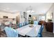 Bright open floor plan flows from the kitchen to the dining room with beautiful hardwood floors at 17330 Graley Pl, Westfield, IN 46074