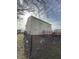 Back exterior view of a home with a wood deck, fenced yard, and mature trees at 1881 Harvest Meadow Dr, Greenwood, IN 46143