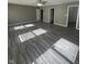 Spacious primary bedroom with neutral paint and laminate flooring. Multiple entry doors visible at 1881 Harvest Meadow Dr, Greenwood, IN 46143