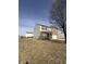 This house features a well-maintained lawn and a chain-linked fence surrounding the property for added privacy and security at 1881 Harvest Meadow Dr, Greenwood, IN 46143