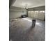 Spacious garage with a sectional door, ample storage, and potential for multiple uses at 1881 Harvest Meadow Dr, Greenwood, IN 46143